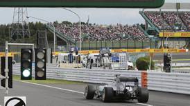 Nico Rosberg beats Lewis Hamilton to pole in Japan