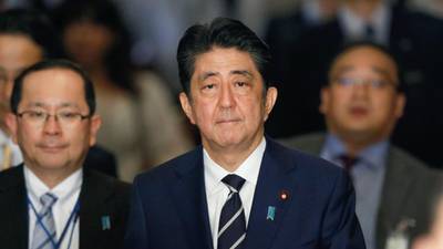Japanese prime minister fights for his political life