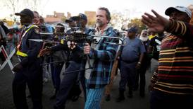 South Africa police detain cameraman