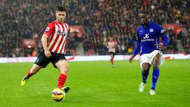 Shane Long brace sends Saints four points from the summit
