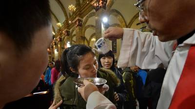 China's Catholics pray as Communist Party and Holy See lock horns