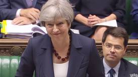 Theresa May signals easing of economic austerity