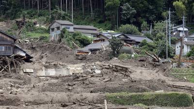 Roads and buildings submerged as torrential rain lashes Japan