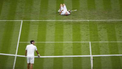 Federer avoids slip up as Mannarino retires injured