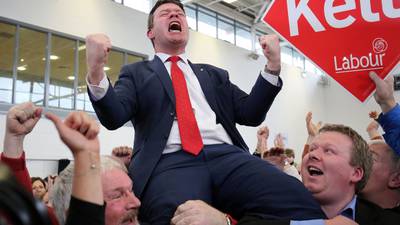 Alan Kelly celebrates with pose of  a boxer who floored an opponent