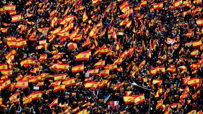 Tens of thousands rally against Madrid’s conciliatory stance on Catalonia