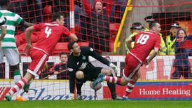 Adam Rooney helps Aberdeen to late win over Celtic