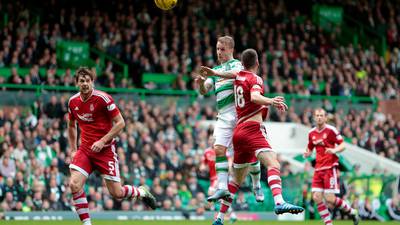 Leigh Griffiths scores twice as Celtic go seven points clear at top