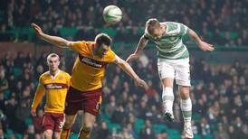 Celtic stroll past Motherwell and return to summit