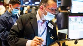 European shares end lower but mark first positive week this year