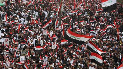 Tens of thousands march in Baghdad to demand US expulsion