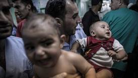 Babies and elderly among 15 killed in Gaza school