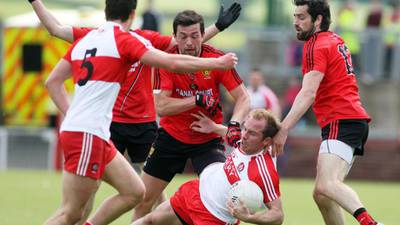 Derry just edge it as  Down are left to rue missed opportunities